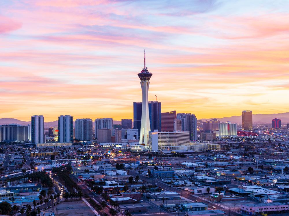 Stratosphere building over Las Vegas skyline at sunset