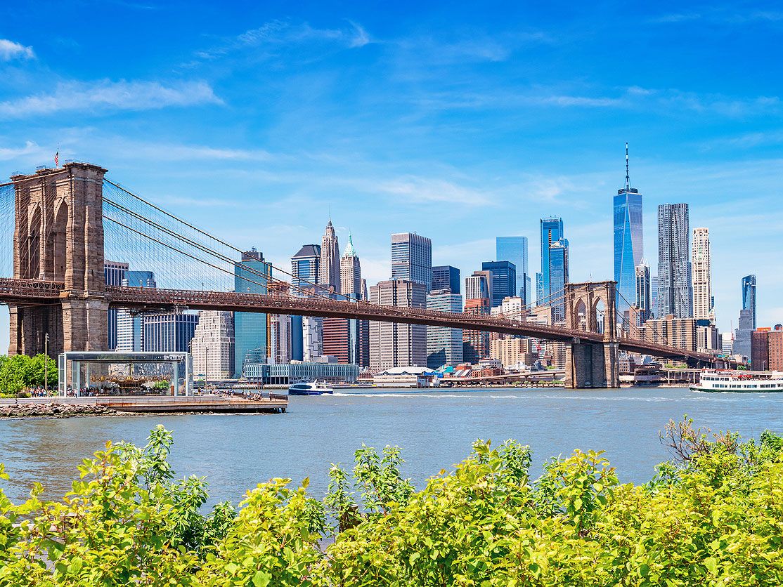 View of Brooklyn Bridge and skyline of Lower Manhattan borough of New York City