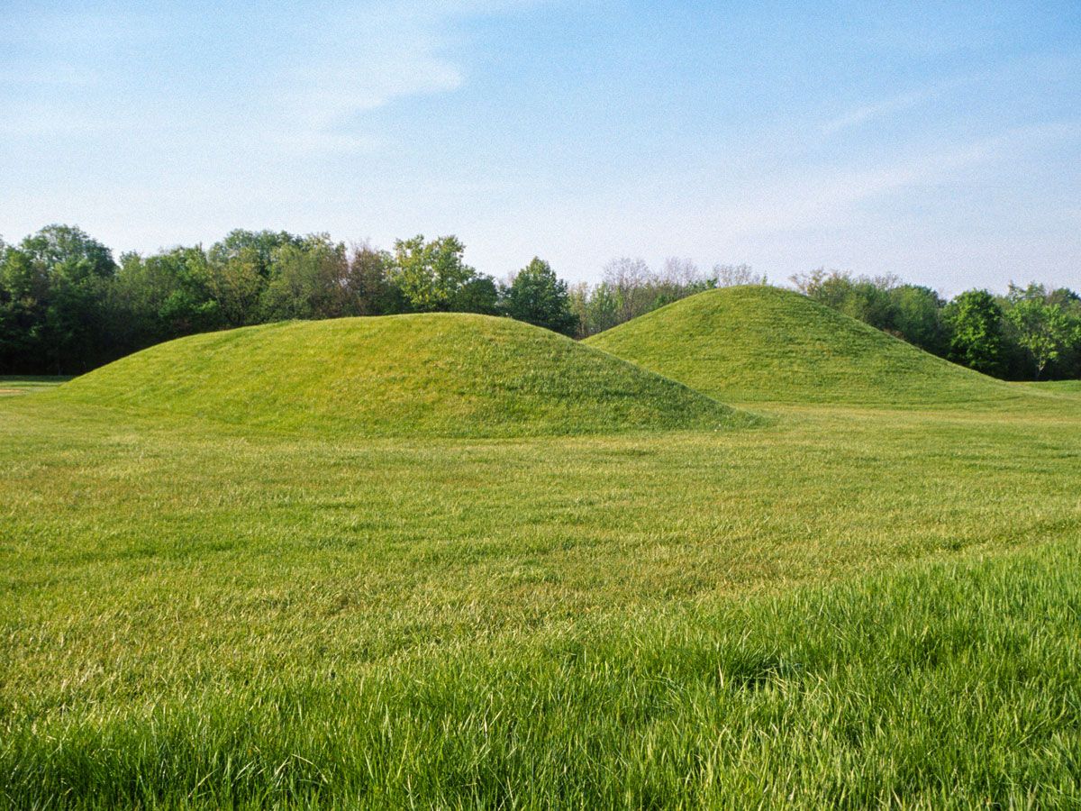 Grass-covered earthen mounds in Ohio's Hopewell Culture National Historical Park 