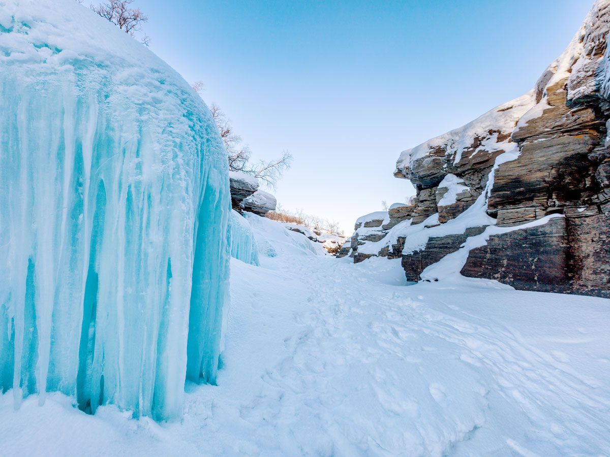 Snow- and ice-covered landscape of Sweden's Abisko National Park