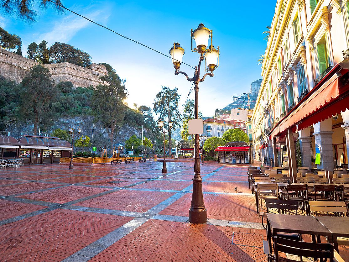 Empty tables along plaza in Monaco