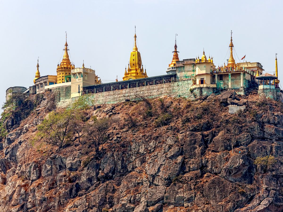 Upward-facing view of Taung Kalat monastery atop extinct volcano in Myanmar