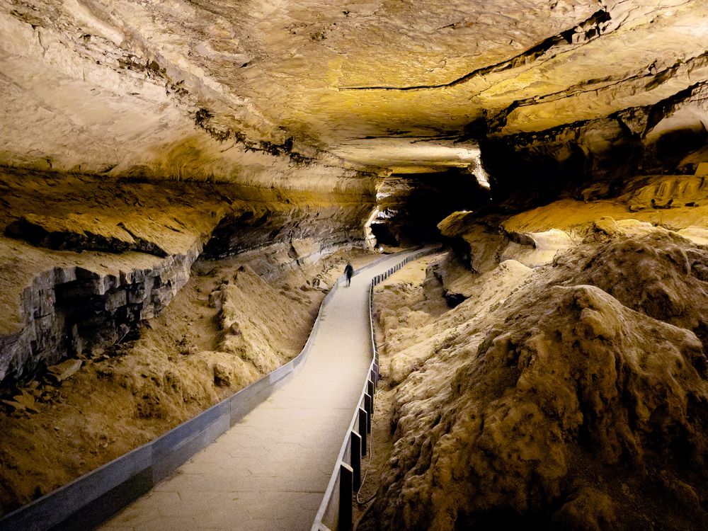Person walking through pathway in Kentucky's Mammoth Cave
