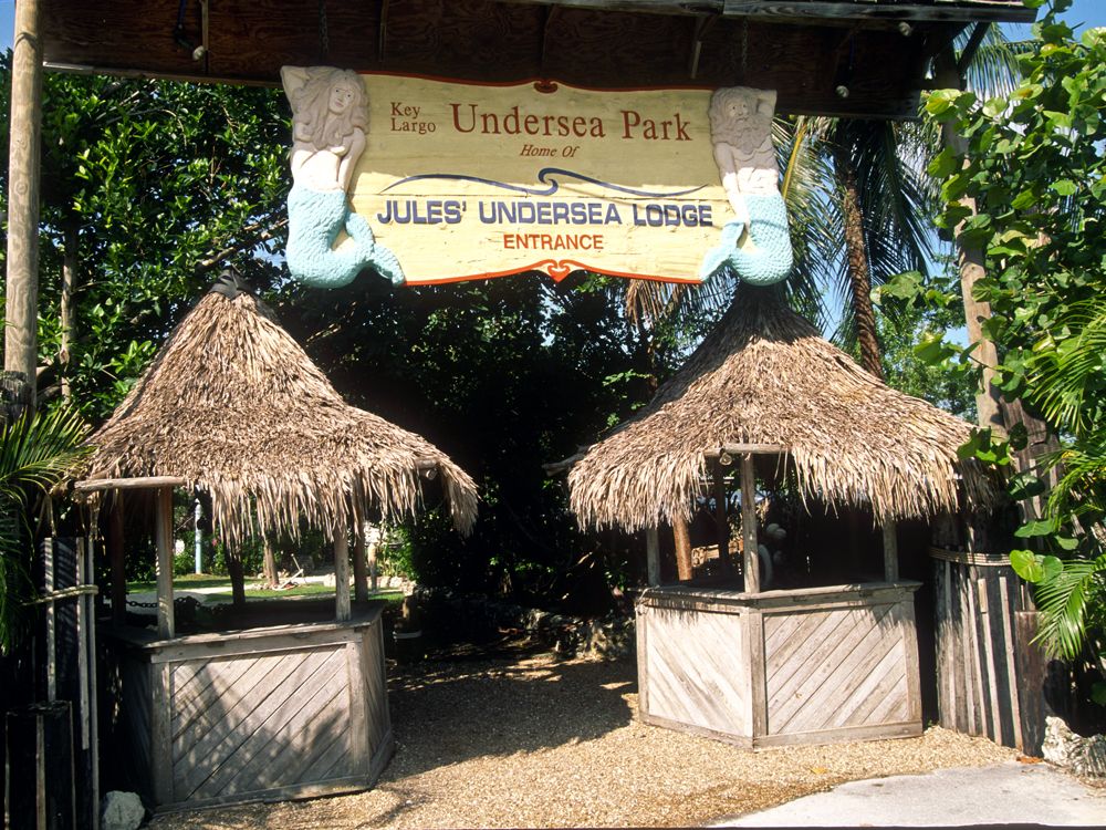Beach huts at entrance to Jules Undersea Lodge in Key Largo, Florida