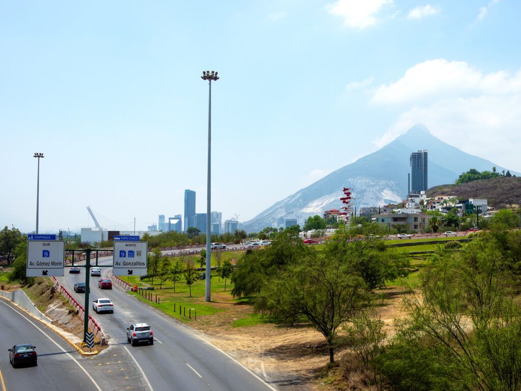 Highway exit with view of Cerro del Topo Chico in Monterrey