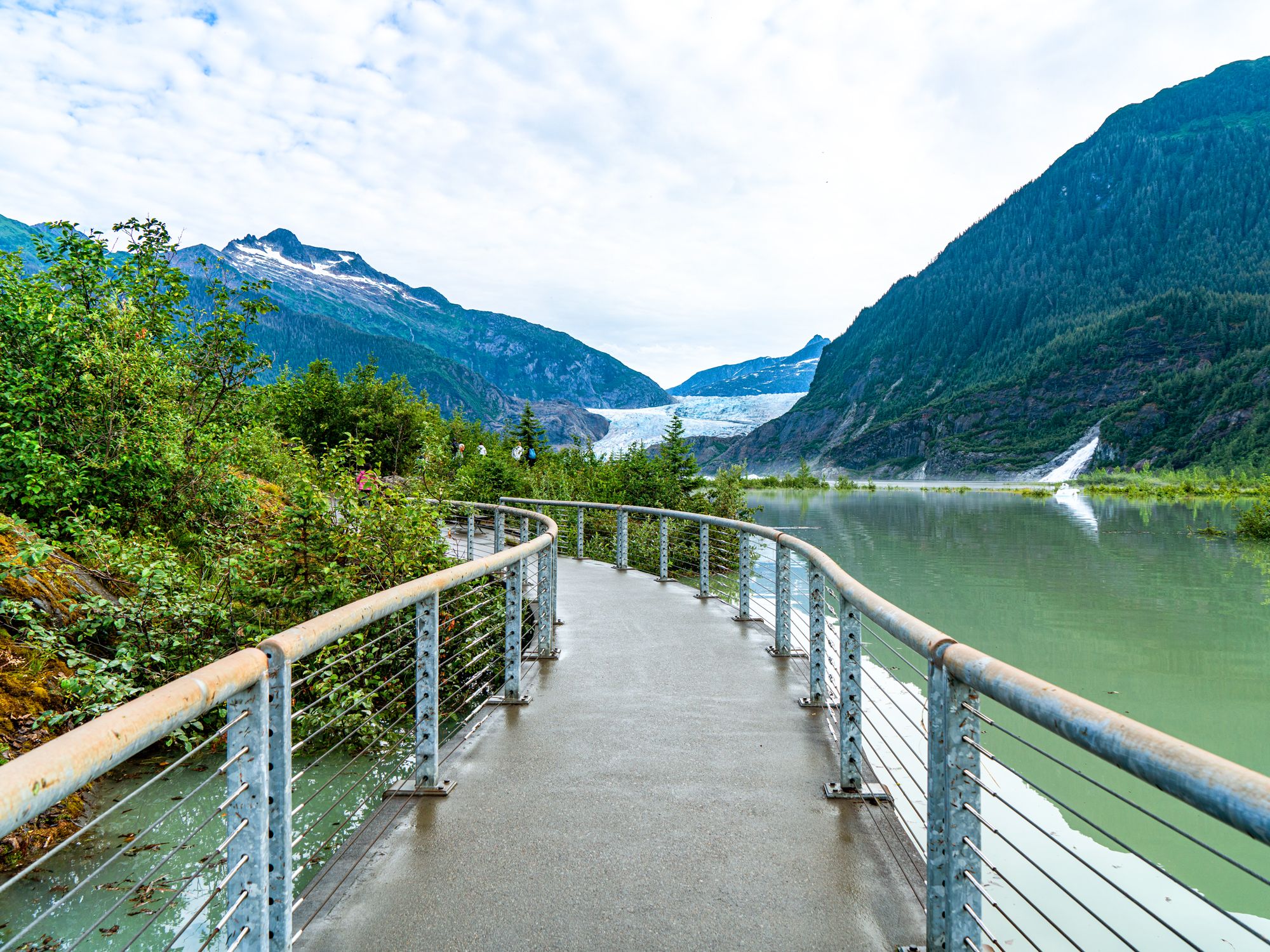 Pedestrian bridge with view of glacier in Juneau