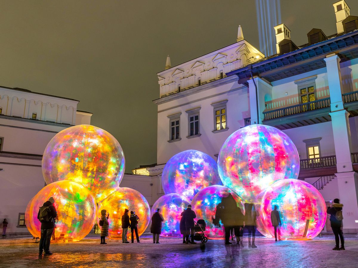 Onlookers admiring exhibits at the Vilnius Light Festival in Vilnius, Lithuania