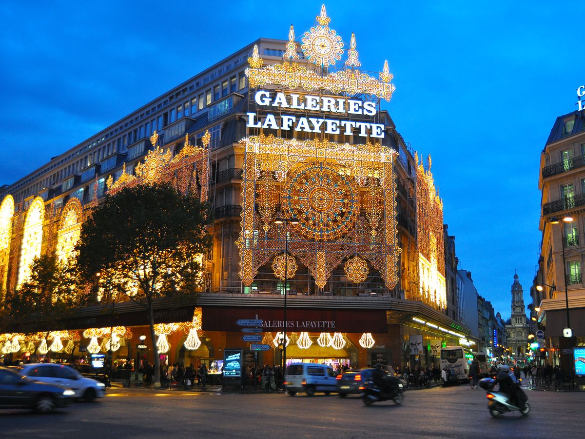 Galeries Lafayette in Paris, France, illuminated during evening hours