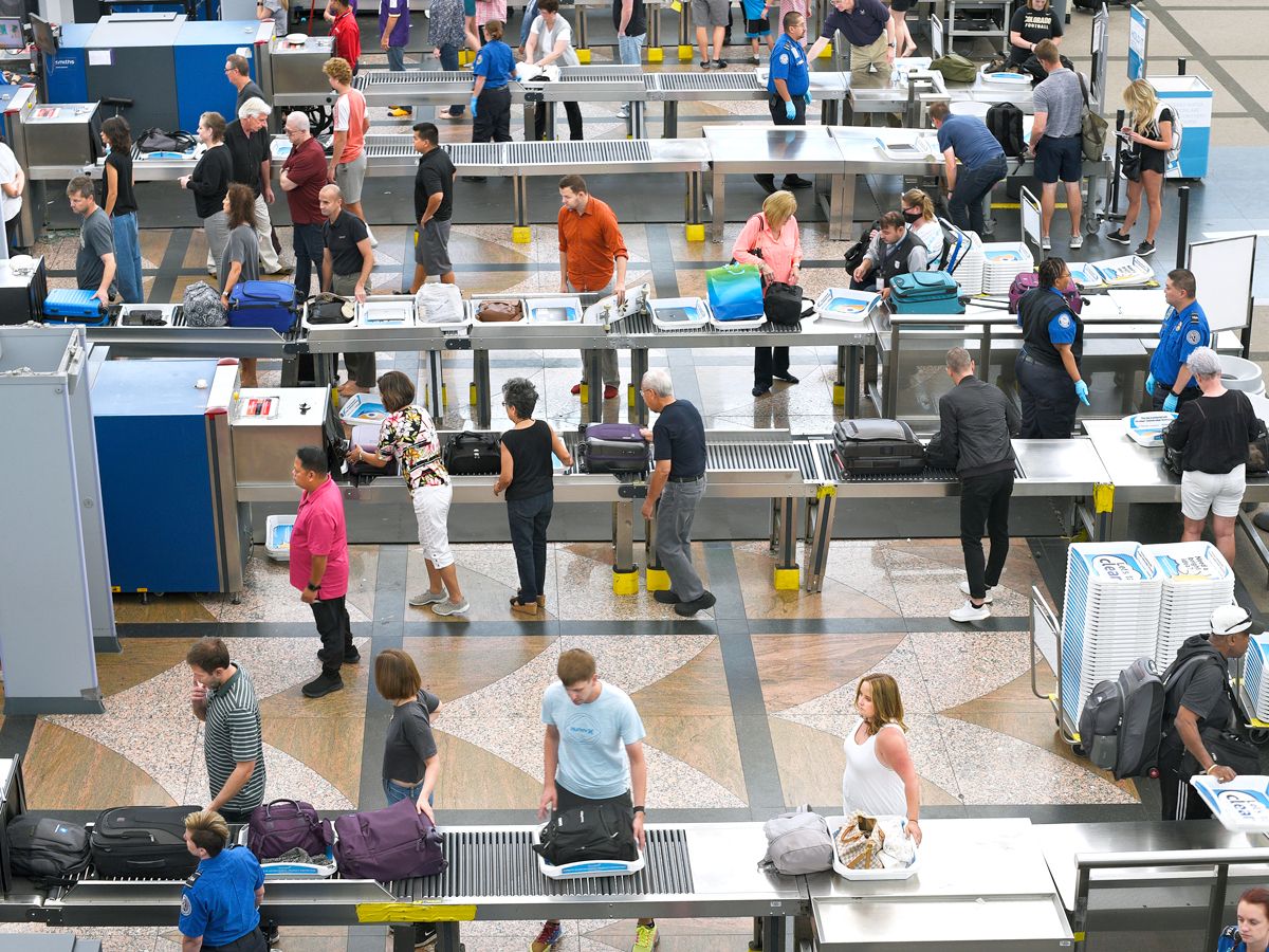 Busy TSA security line at airport, seen from above
