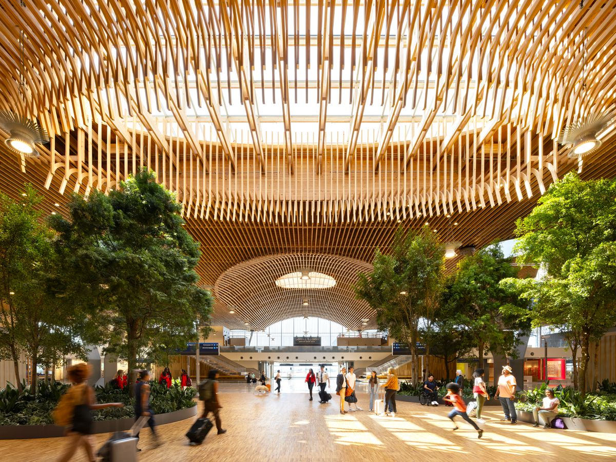 Light-filled interior and timber ceiling of new Portland International Airport terminal