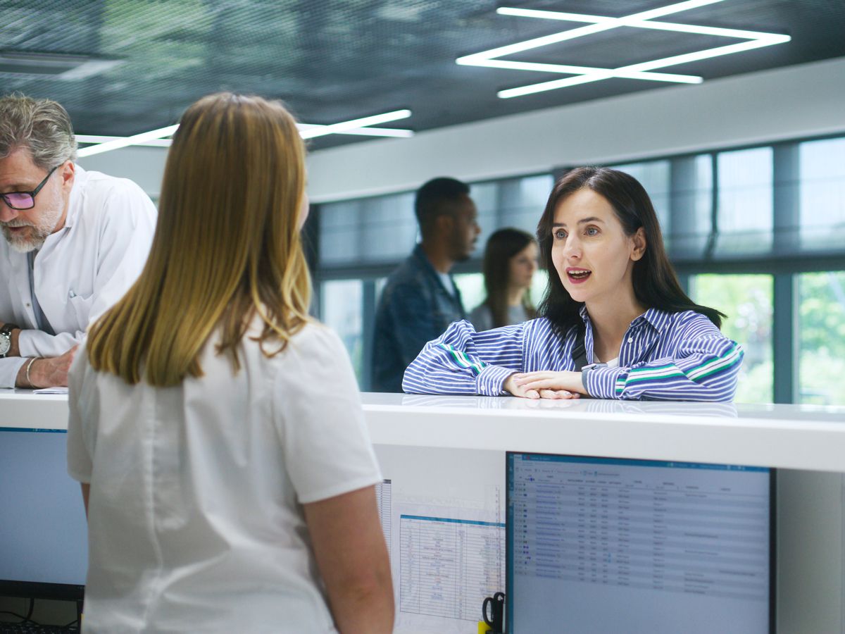 Customer speaking to airline staff