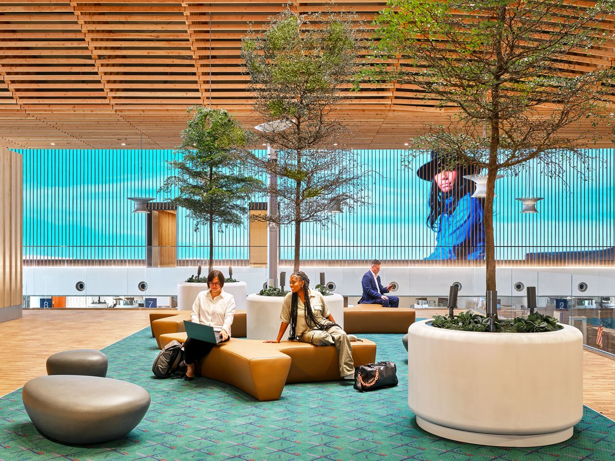 Passengers in seating area of new PDX terminal