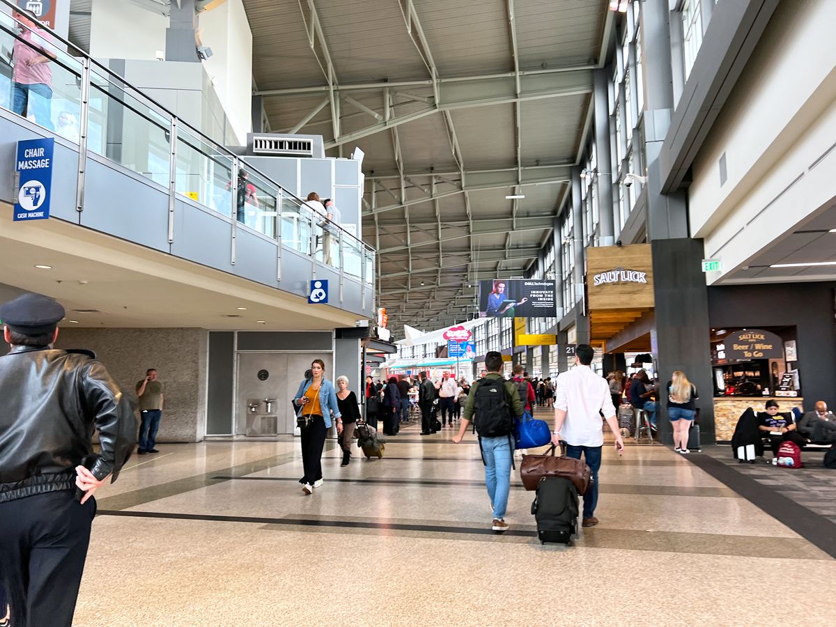 Passengers walking through terminal at Austin-Bergstrom International Airport