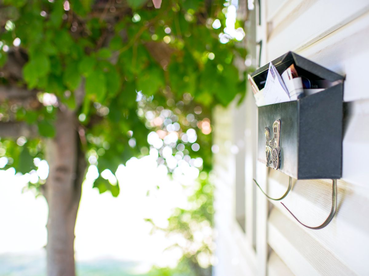 Mailbox filled with mail