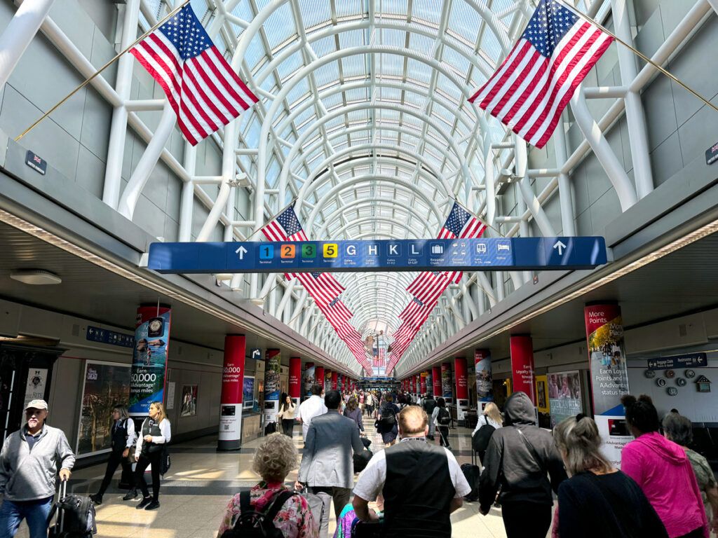 Passengers walking through terminal at O'Hare Airport