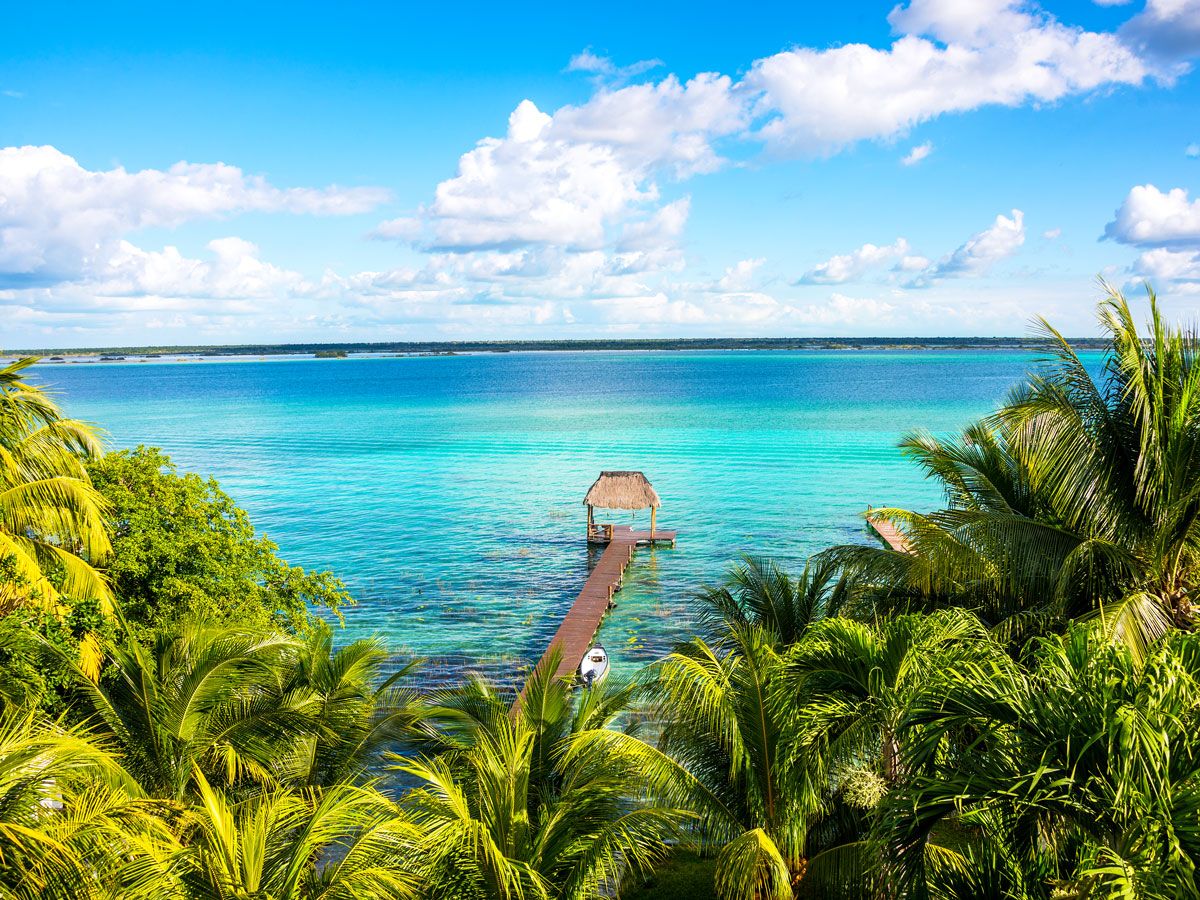 Pier extending out over the turquoise waters of the Caribbean