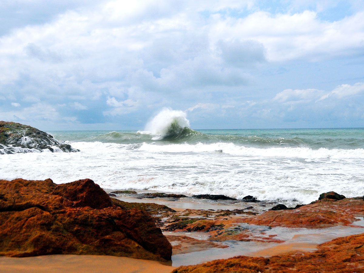 Waves crashing along the coast of the Gulf of Guinea