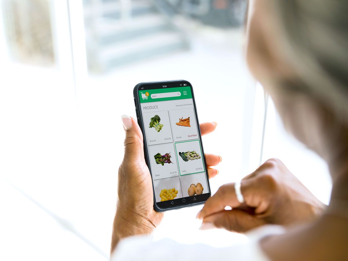 Person using cellphone to order groceries