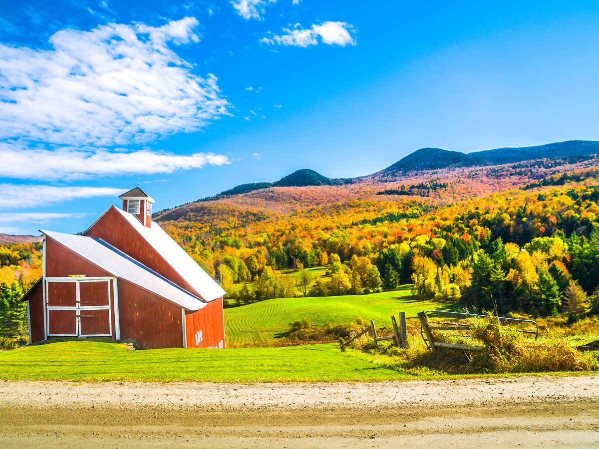 Roadside barn and fall foliage in rural Vermont