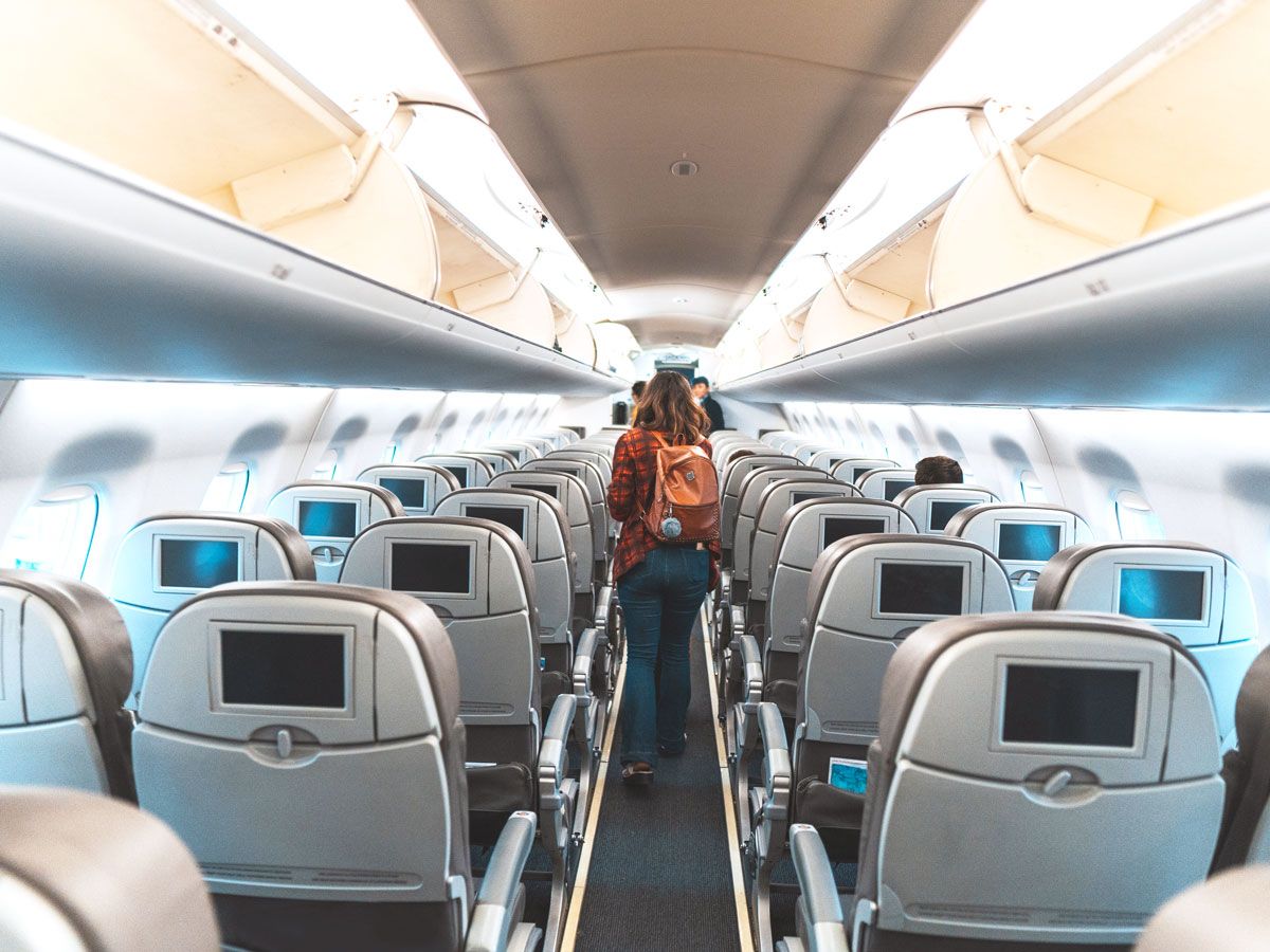 Passengers disembarking aircraft after flight