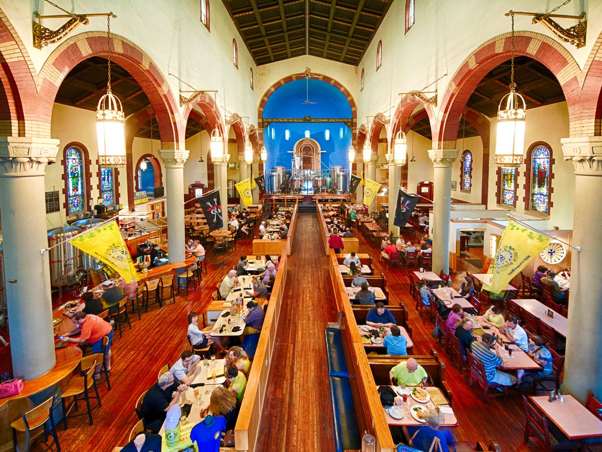 Patrons inside the Church Brew Works in converted church building in Pittsburgh, Pennsylvania