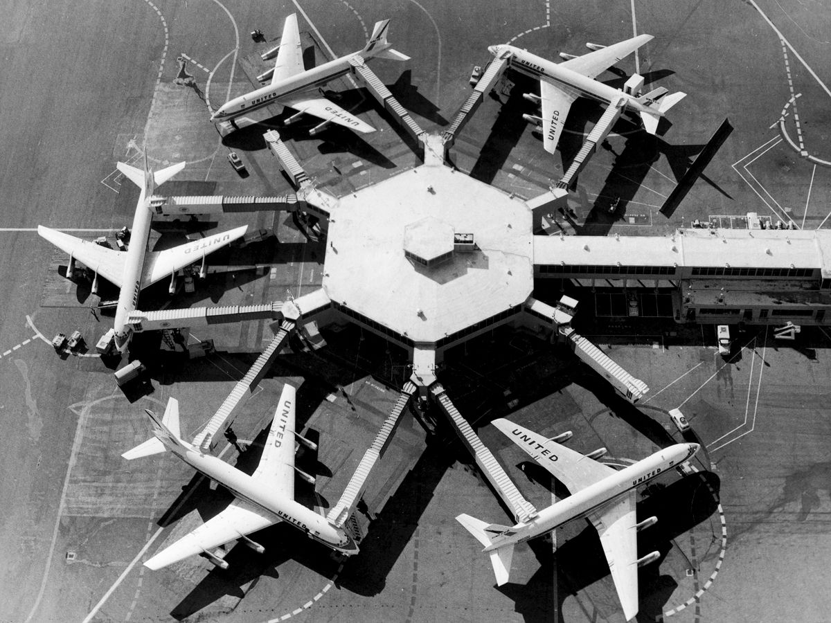 Historical image of early jet bridges at San Francisco International Airport, seen from above
