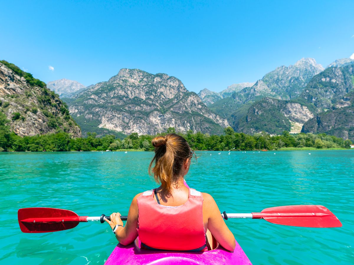 Person kayaking on Lake Como