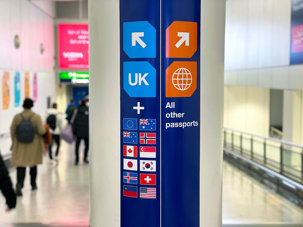 Signs at airport customs and immigration facility