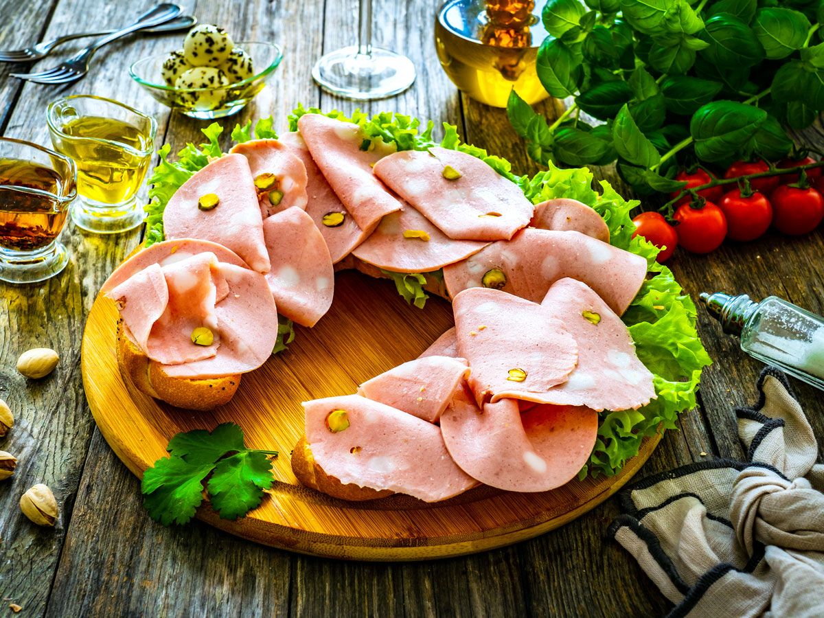 Board with mortadella