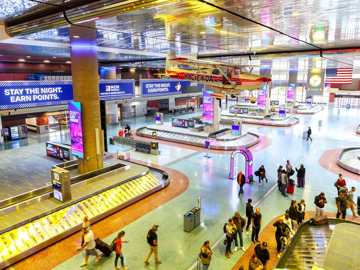 Passengers waiting in baggage claim area at Las Vegas Harry Reid Airport in Nevada