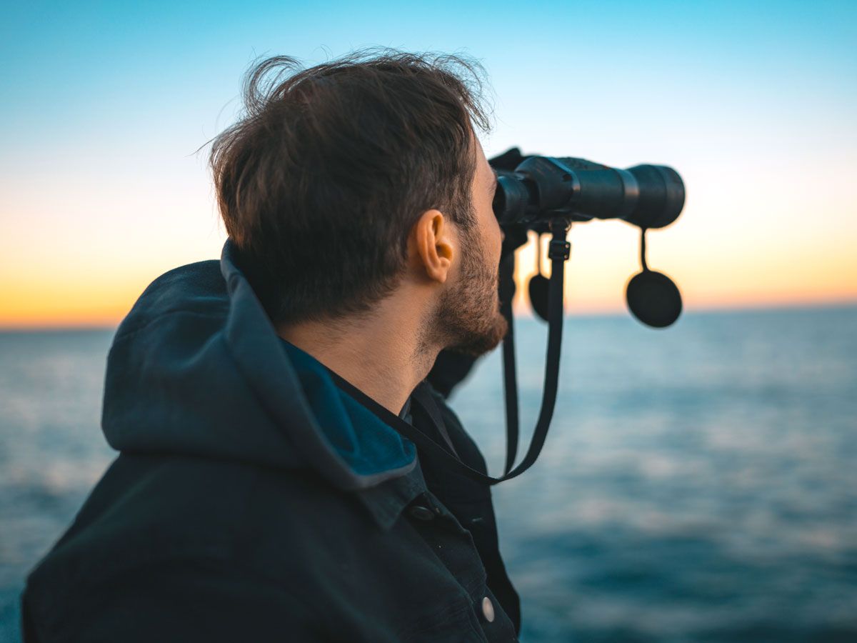 Man using binoculars