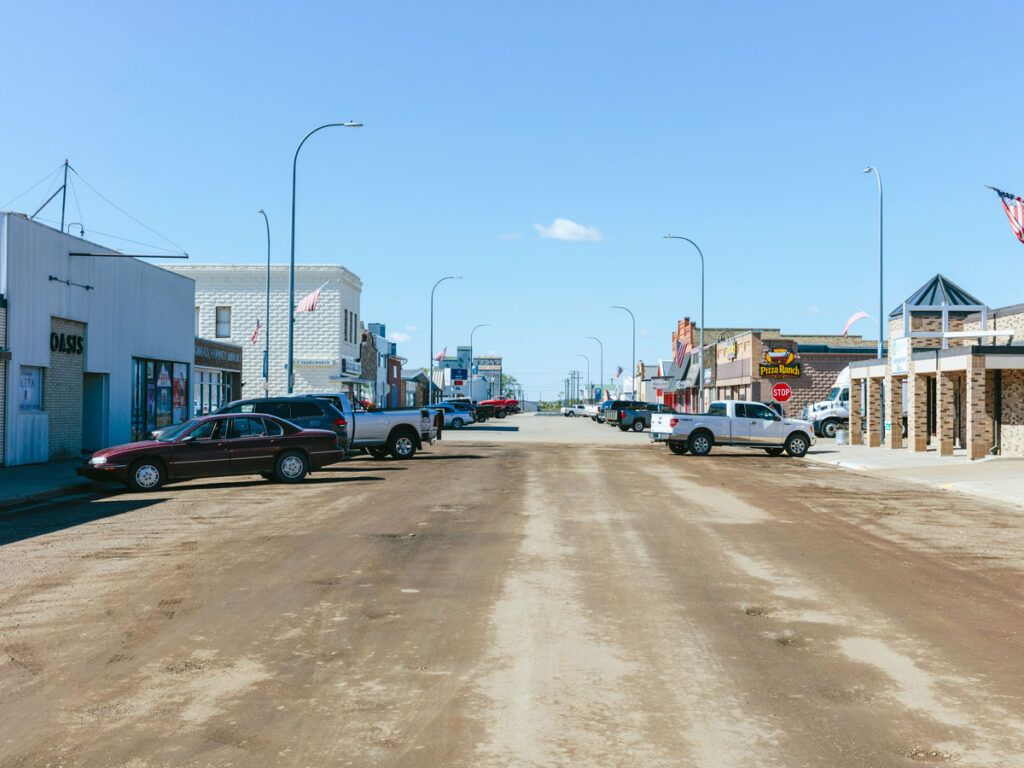 Cars parked on a small town street