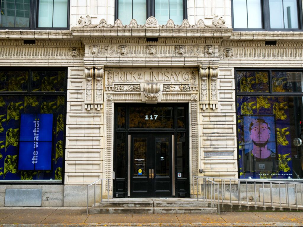 Entrance to Andy Warhol Museum in Pittsburgh with original Frick & Lindsay Co. sign above