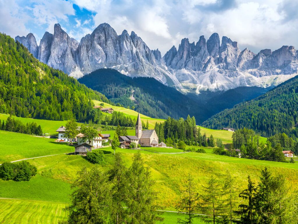 Village in the shadow of the Dolomites in Italy