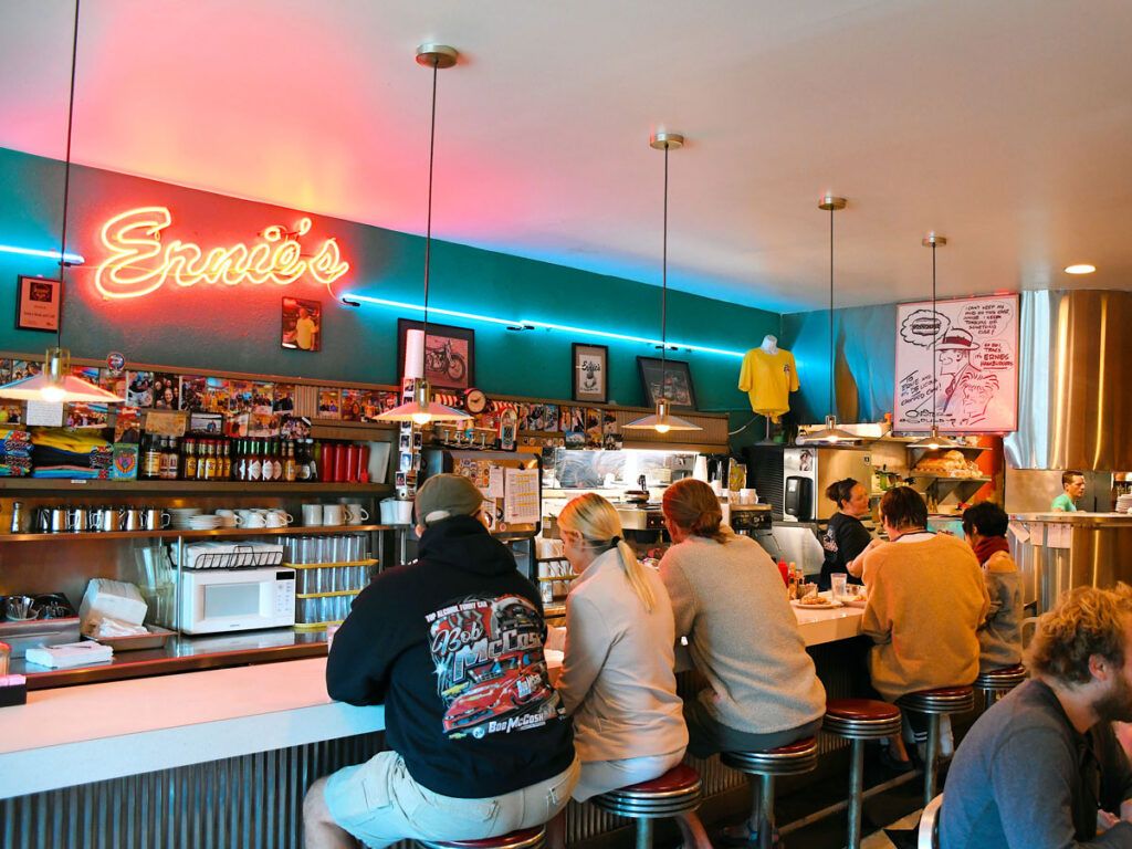 Patrons seated at the bar inside Ernie's in Columbia, Missouri