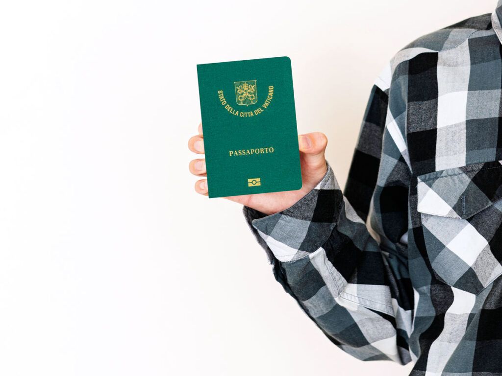 Person holding Vatican City passport