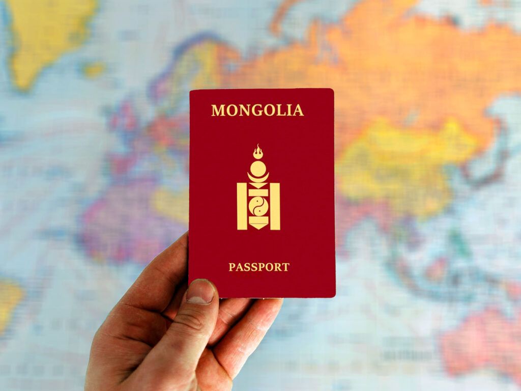 Person holding Mongolian passport