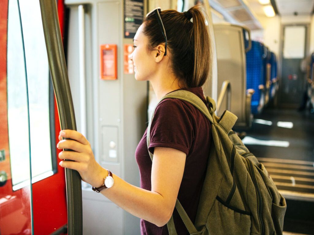 Amtrak rider standing by doors