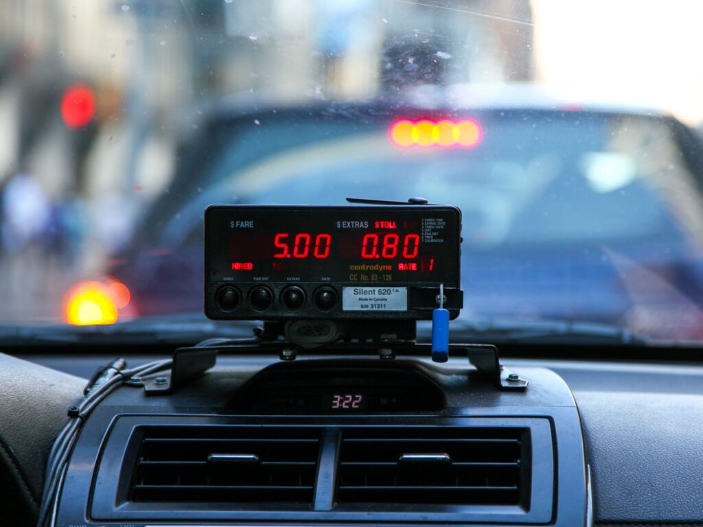 Close-up view of a taxi meter