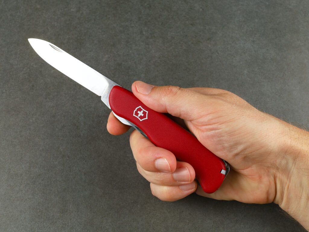 Person holding a pocket knife