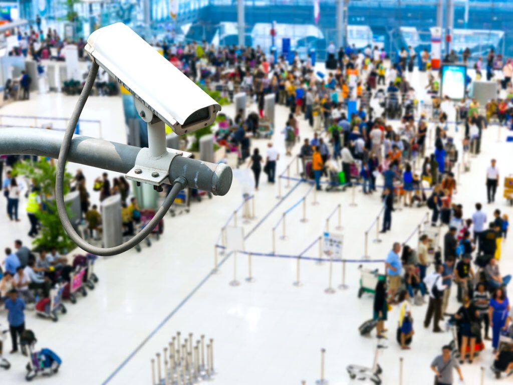 Security camera overlooking airport terminal