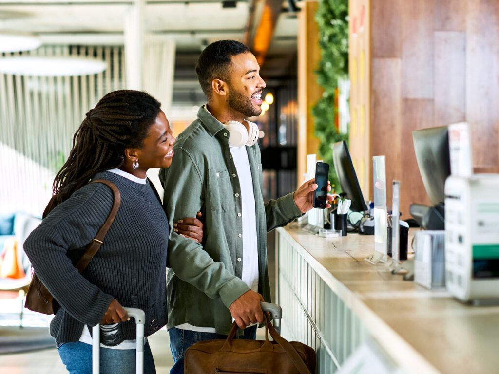 Couple checking in to hotel
