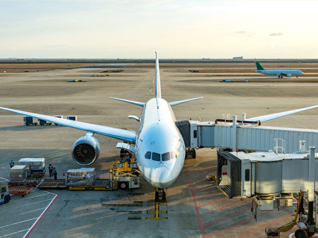 A Boeing 787 parked at the gate