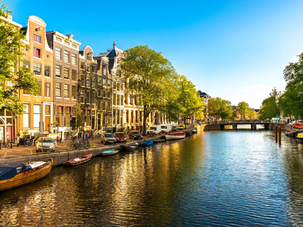 Boats docked on Amsterdam canal