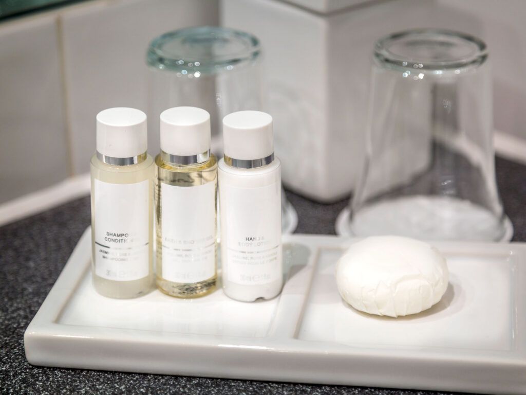 Toiletries in a hotel room bathroom