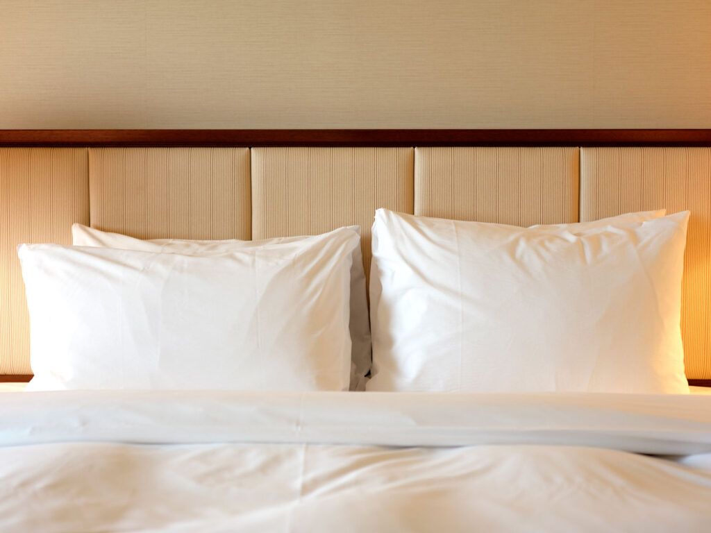 A bed in a hotel room