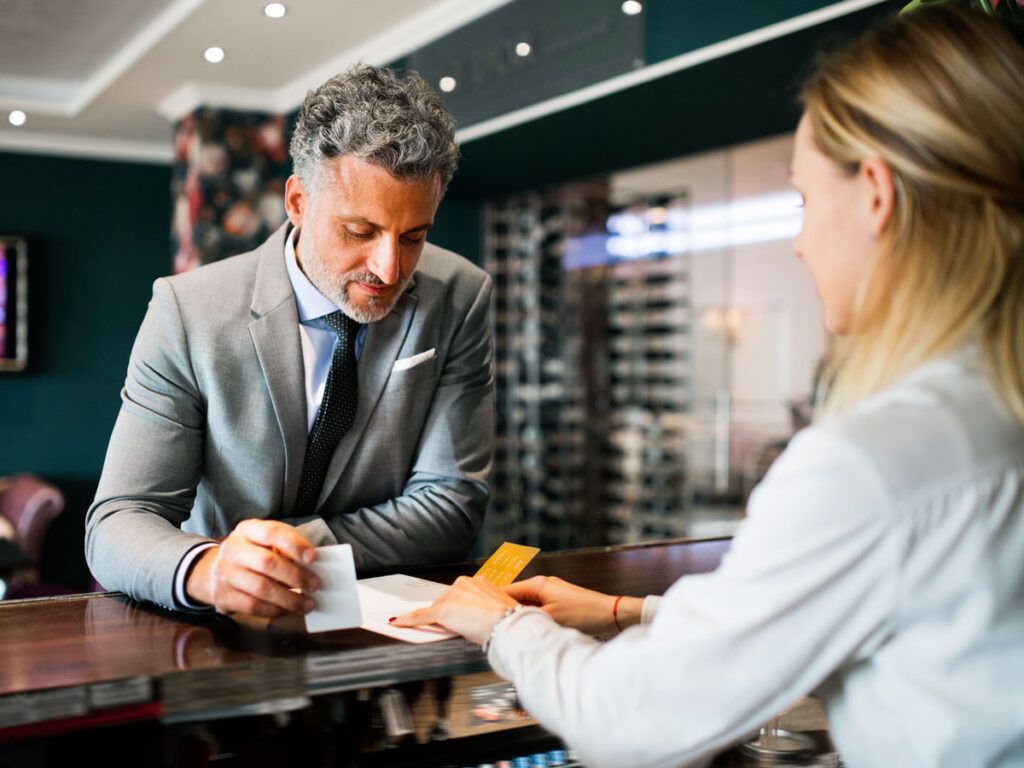 Businessman at hotel reception