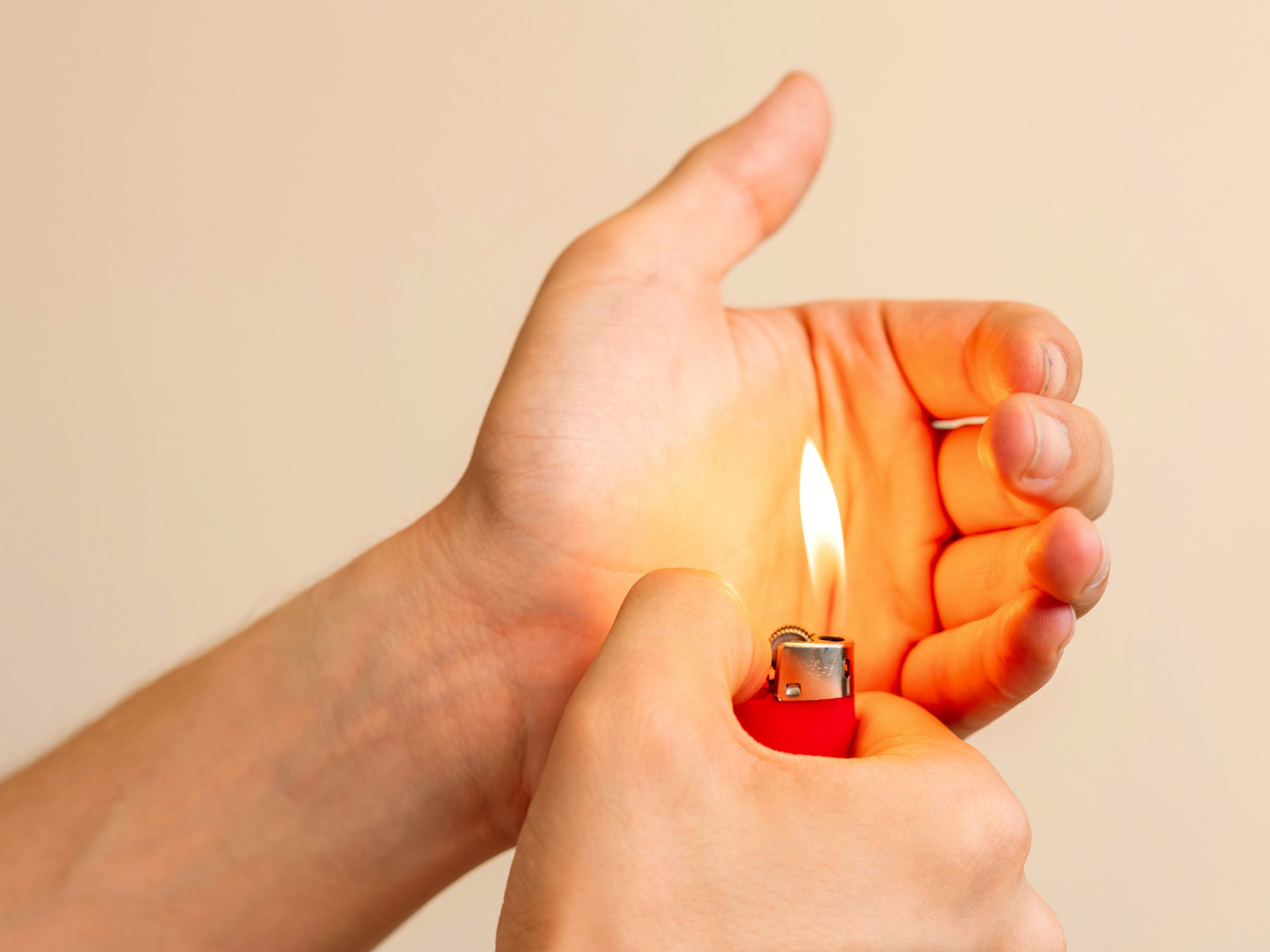 Person holding a lighter
