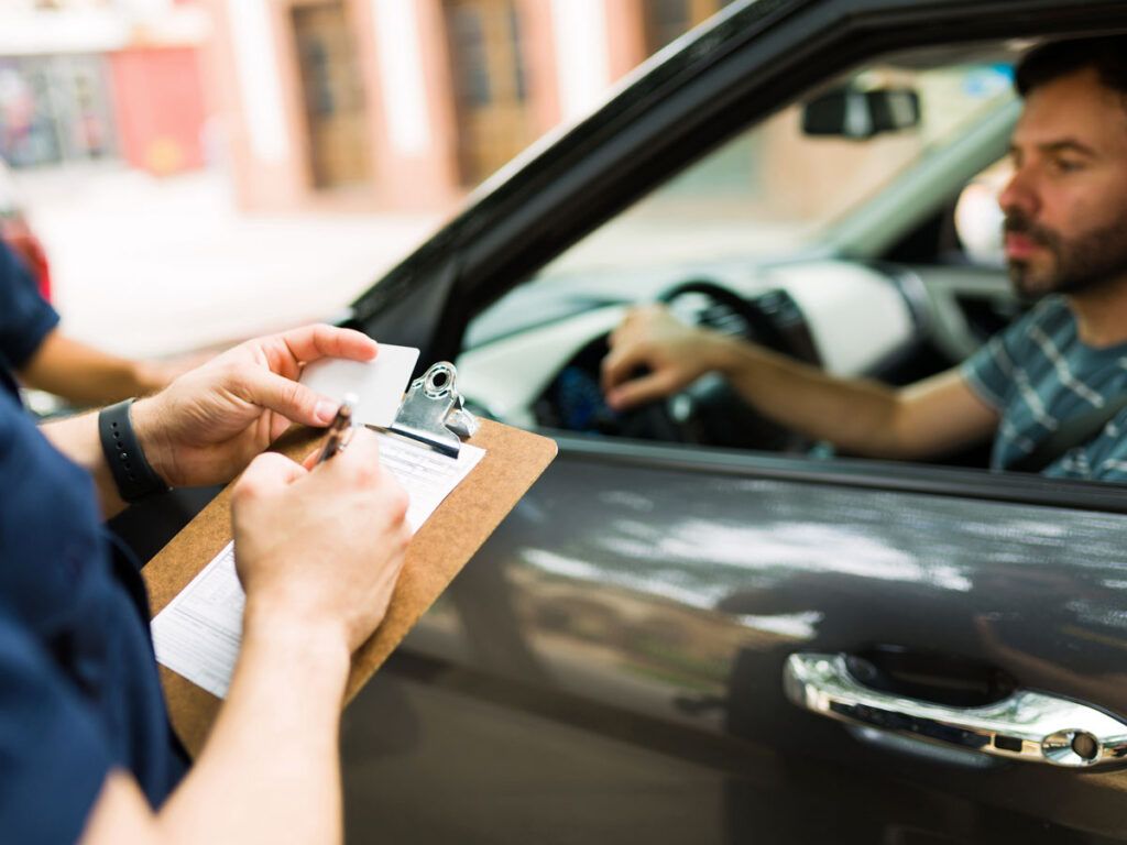 Man receiving a traffic ticket