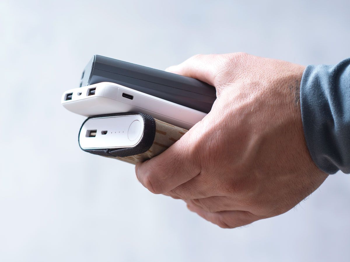 Person holding power banks